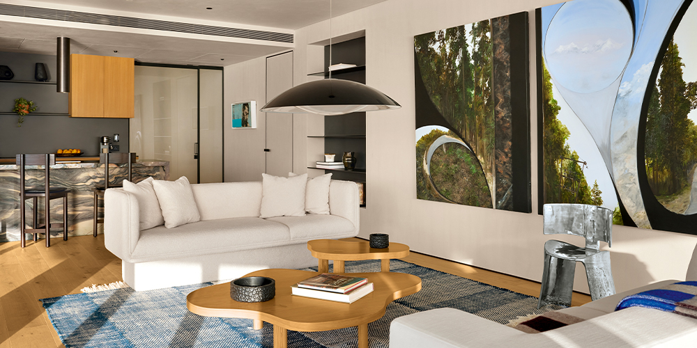 Coordination merges Berlin attic apartments to create artsy penthouse