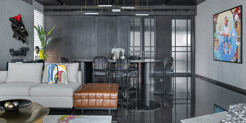 This Mumbai home by a&k Design Studio dares to imbue dark greys