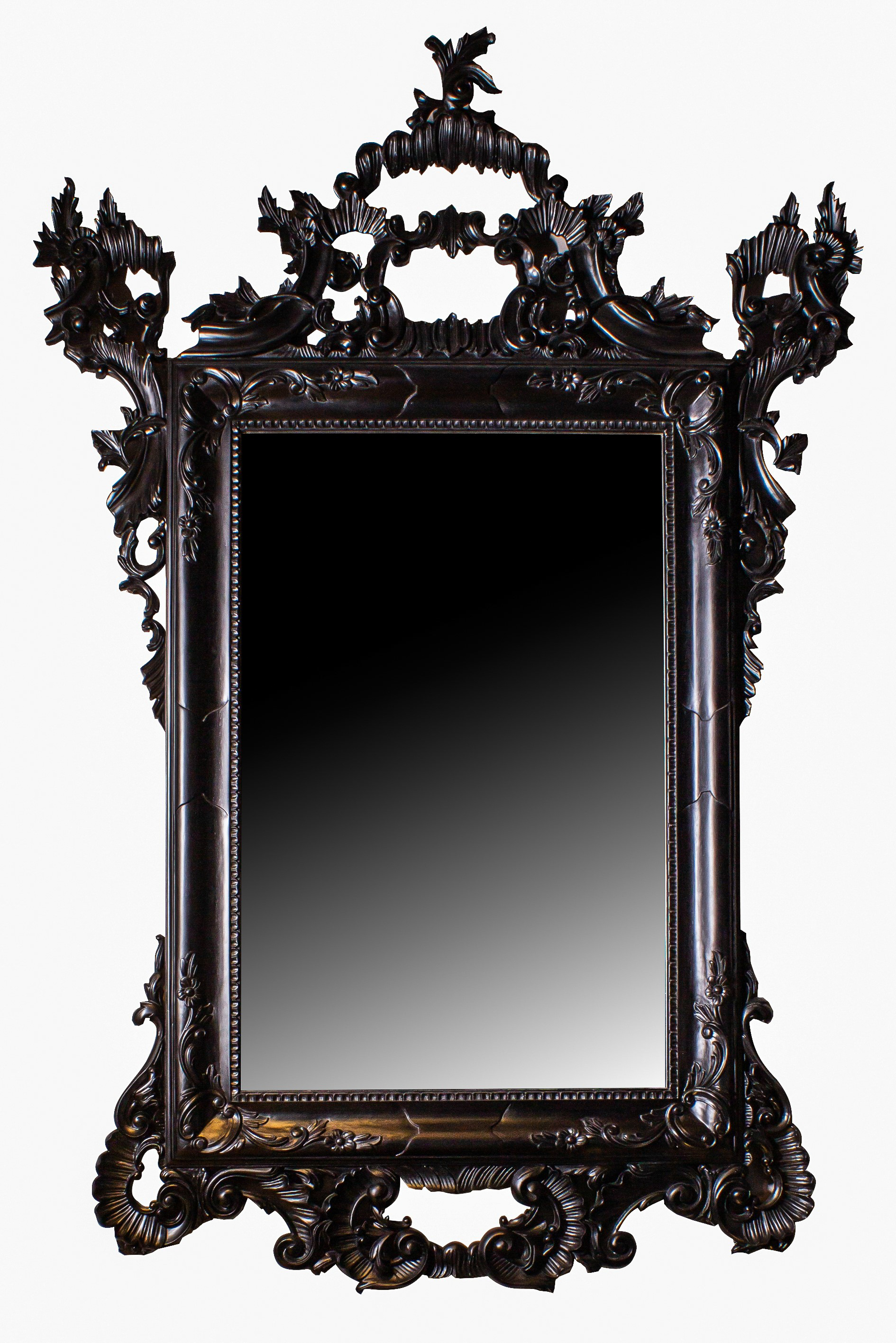 Ornately hand-carved wall mirror