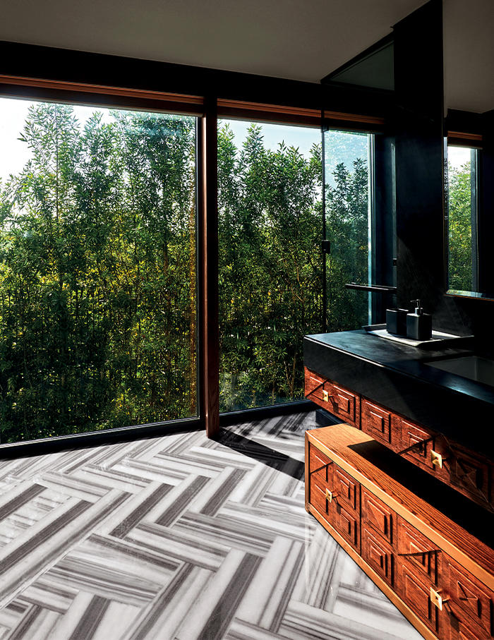 The son’s bathroom with fixtures from Grohe overlooks the Jahanpanah Forest; Photography by Ashish Sahi