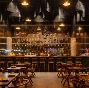 At Pincode 24 Bengaluru by ROAR Design Studio industrial chic meets cosmopolitan rustic