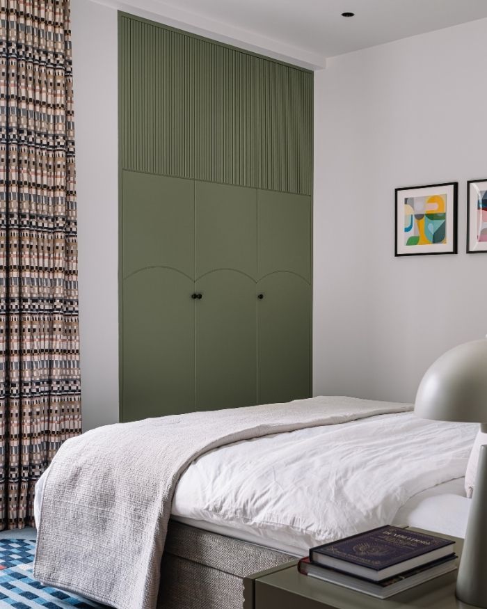 A soft wave of understated opulence permeates the bedroom, enhanced by the pale oak millwork by DeMuro Das, paired with upholstered headboards in richly woven fabrics; Photography by Ishita Sitwala