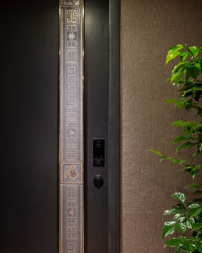 The front door foreshadows the drama to follow; Photography by Prashant Bhat