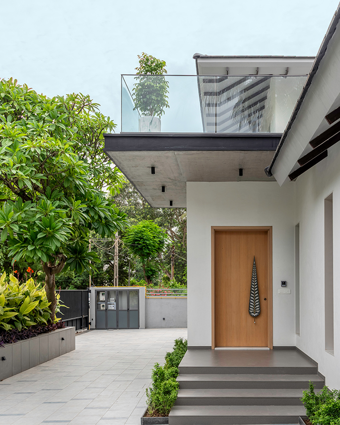 noteworthy wooden door at the stone stepped stairway