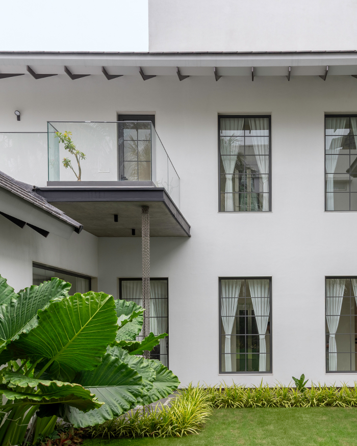 Foliage and plants grace the courtyard; Photography by PHX India