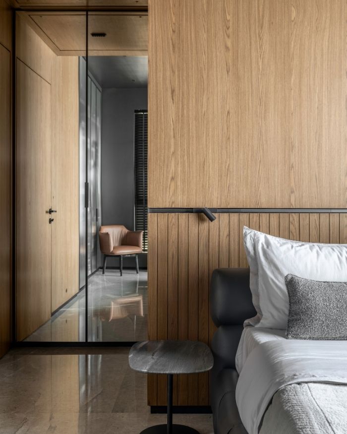 Soft furnishings from Saks Beautiful Living sit atop a custom bed; Styled by Sakshi Pathak; Photography by Photographix