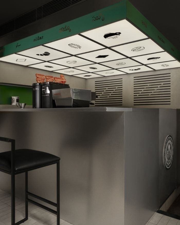 A Subko coffee bar rests within the store; Photography by Avesh Gaur