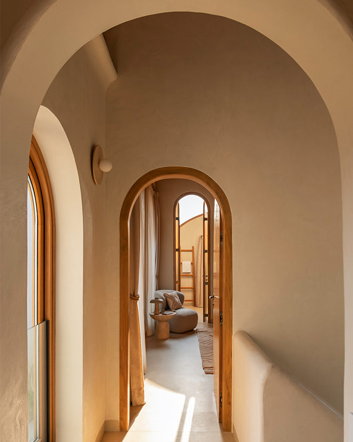 The spaces flow into each other seamlessly and are separated by arches that add to the design vocabulary of the home; Photography by Elmer S D’Souza and Abhijit Parsekar, The Photoarchitects