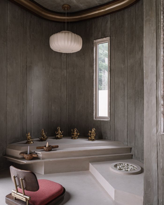 The mandir showcases idols by
Monil Kyada and a hanging light from Name Place Animal Thing; Photography by Ishita Sitwala