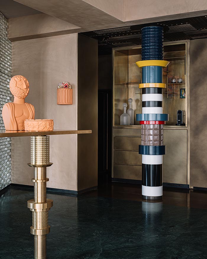 The brass
bar is designed by reD Architects; Photography by Ishita Sitwala