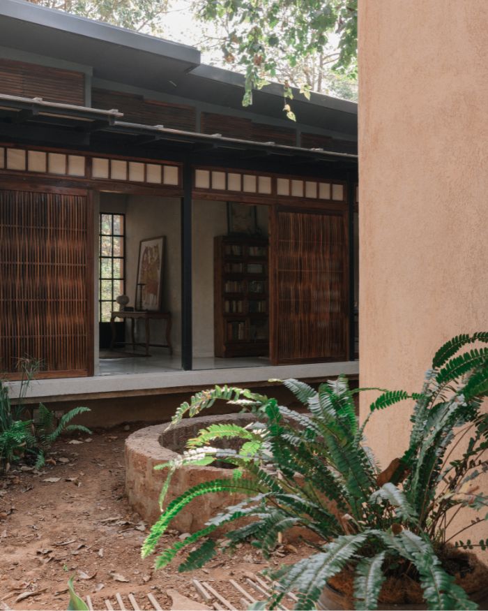 Clay hanging lights from CLAYMEN line the entry passage; Styled by Imran Ali Khan and Rishad Patel; Photography by Shantanu Starick