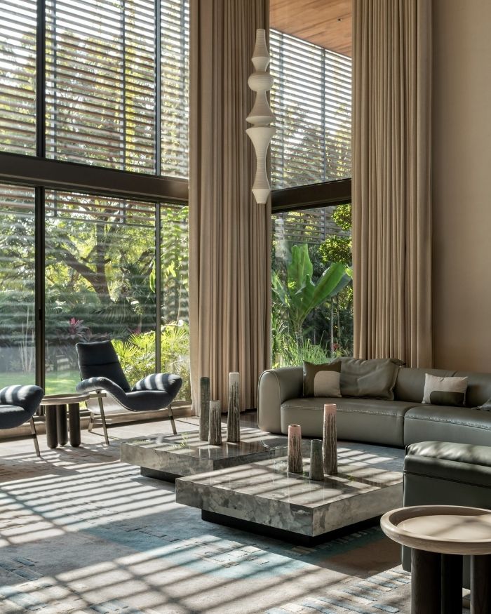 With a soaring double-height volume, the living area becomes the home’s communal locus; Styled by Saniya Tadha, Photography by Vinay Panjwani