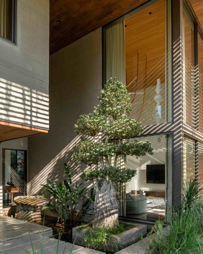 A planted court anchors the living space around its edges, championing an indoor-outdoor living experience; Styled by Saniya Tadha, Photography by Vinay Panjwani