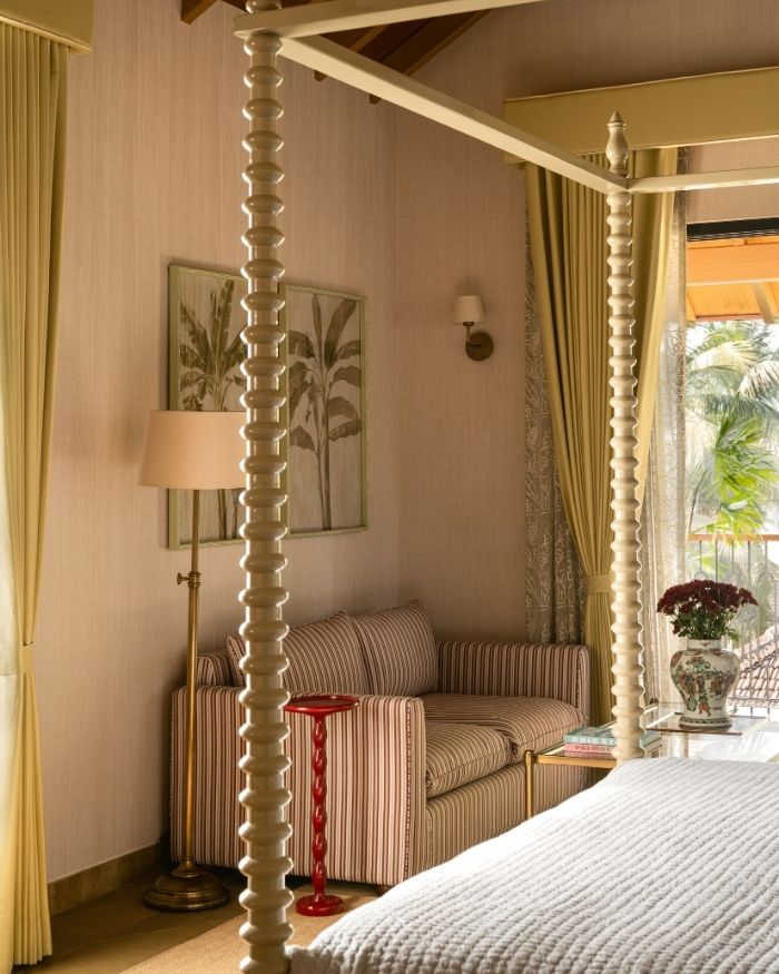 The master bedroom is defined by warmer, wood-led tones that complement the furnishings by Meher Sra Designs, Coffee table and lamps by Pottery Barn and carpet by Neytt; Photography by Nayan Soni