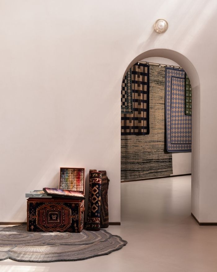 Archway to heritage rug display; Photography by Avesh Gaur