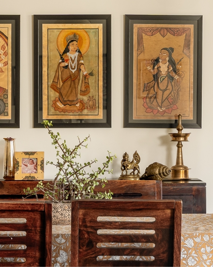 Art forms the emotional heartbeat of the home, gathered largely from Lavanyaβs travels β Kalighat, Pattachitra, Pichwai and Tanjore pieces that give the spaces their sense of accumulated time; Photography by Shine Parsana