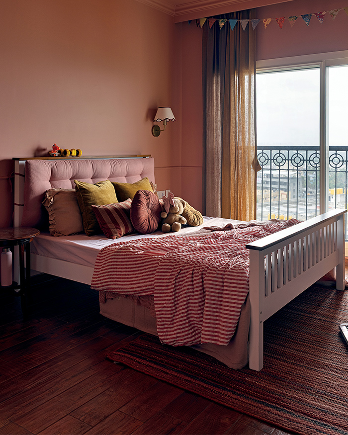 Cushions from Sanctuary Living and
curtains customised by & Rose in different shades of golden hour make the children’s room feel dreamy; Styling by Shivani Raina; Photography by Phosart Studio