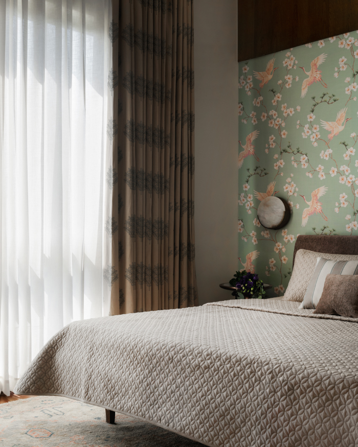 Bedding and a floral wallpaper from Petals Furnishing, backdrop lights from Whispering Homes; Styling by Apoorva Nayak, Photography by Arjun Krishna