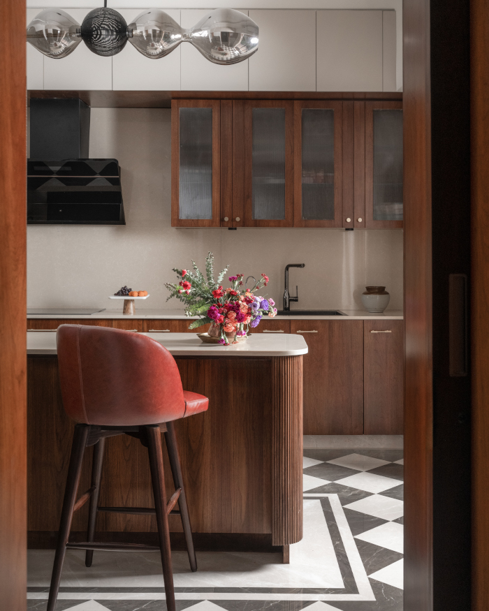 The cosy Dublin Swivel Chair from Gulmohar Lane pairs beautifully with striking Notto Lights by Yaahvi to elevate the kitchen space; Styling by Apoorva Nayak, Photography by Arjun Krishna