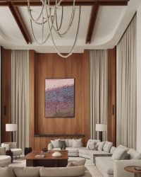 Artwork by Kodanda Rao Teppala sits below the soaring 26 ft roof, on warm teakwood panelling; Photography by Yadnyesh Joshi