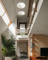 A horizontal window inviting light to the house; Photography by Ram Naresh and Nayan Krishna